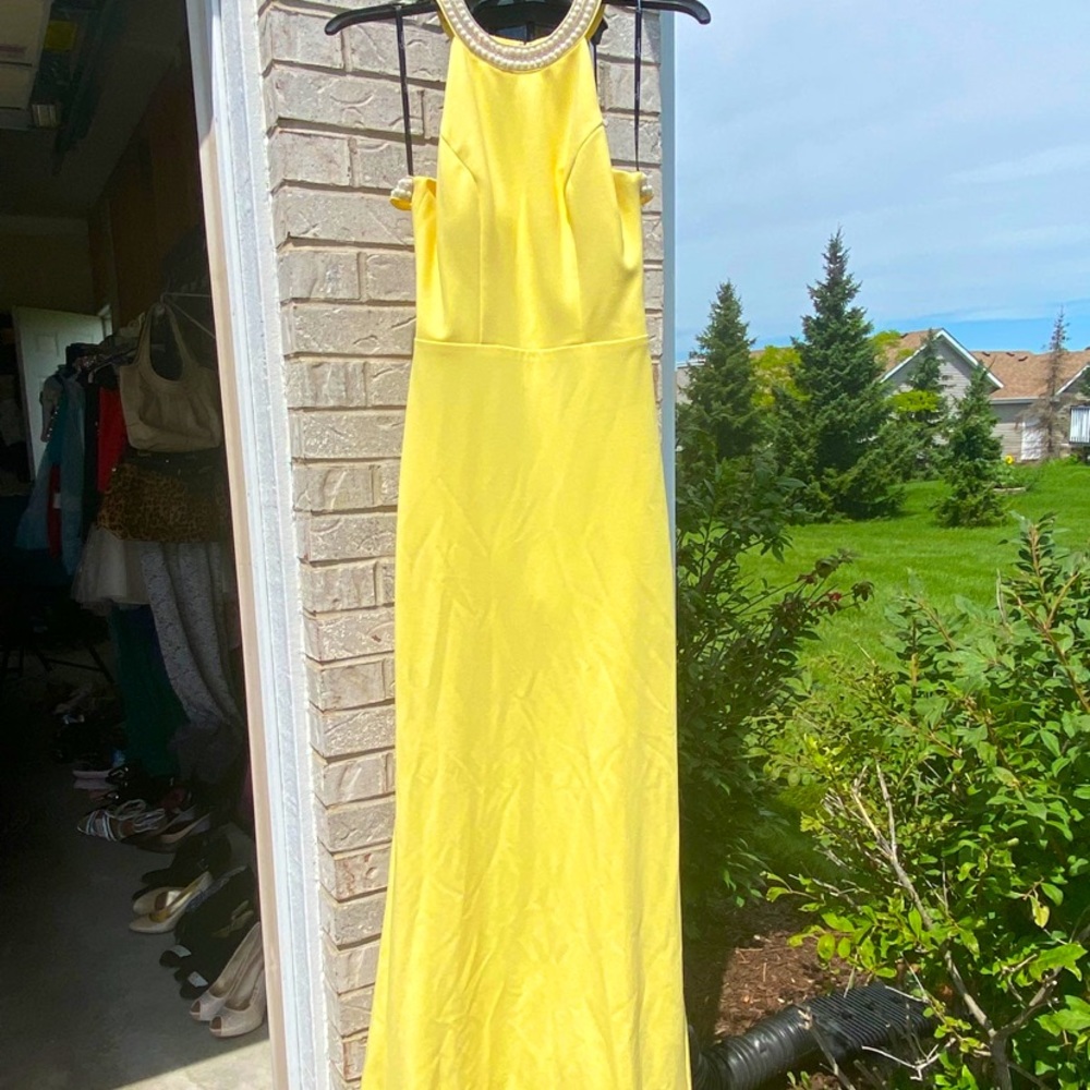 Open bedazzled back prom dress